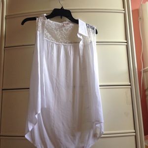 A sheer, partially lace tank top