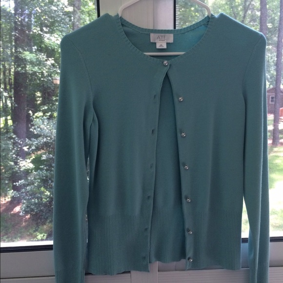 Light blue cardigan with pearl buttons