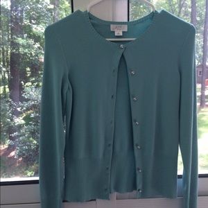 Light blue cardigan with pearl buttons