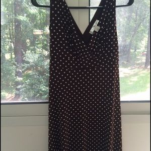 Brown dress with white polka dots.