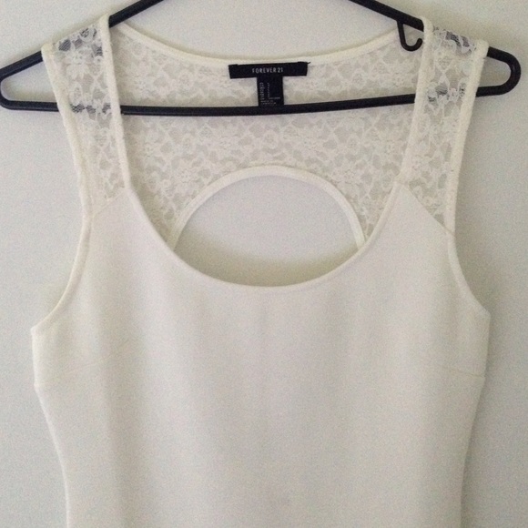 White oval,lace back dress