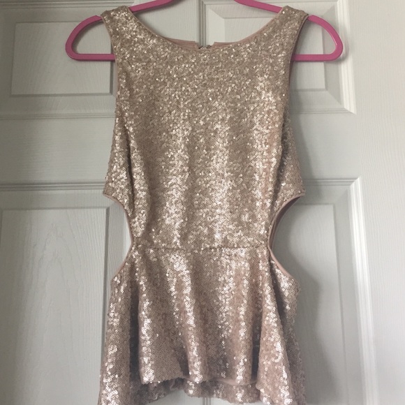 Forever 21 Tops - NWOT Rose gold peplum blouse with cutout sides