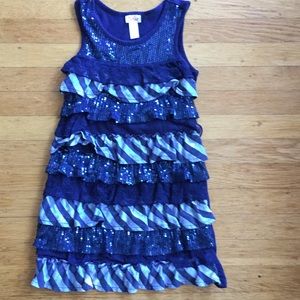 a sequenced justice kids blue lace dress.