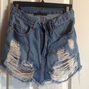 Destroyed denim shorts