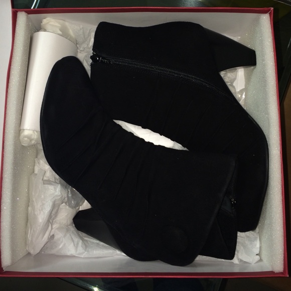 Black suede booties still in box