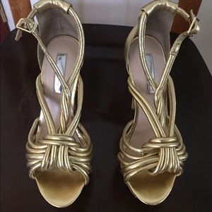 Gold heels by Halston
