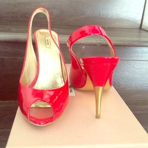 Miu Miu patent leather sling back with gold heel