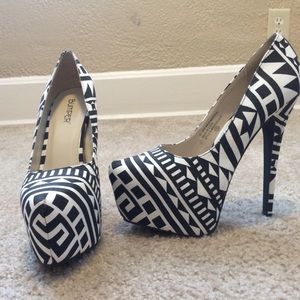 Black and white striped pumps.