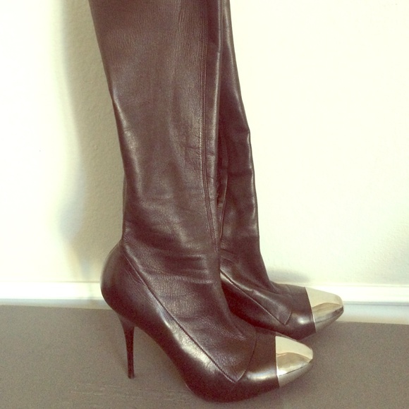Alexander McQueen knee high boots.