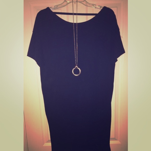 Open-back, black tunic