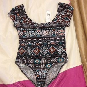 Tribal print body suit