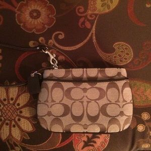 Coach Wristlet. NWOT. Bought at the Coach Outlet