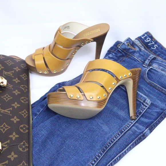 Michael Kors studded platform sandals.