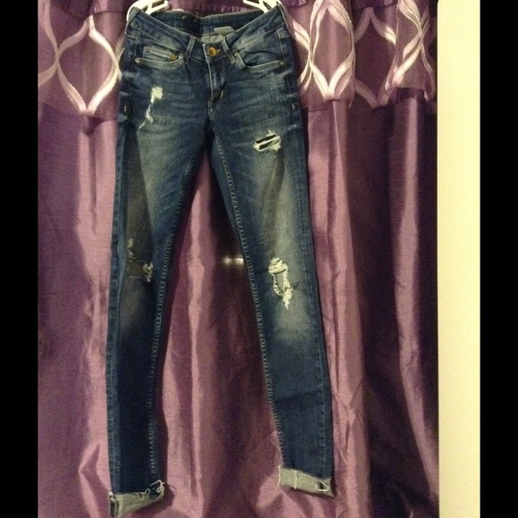 Distressed jeans worn once