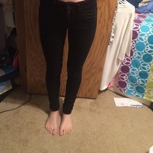 Black mid rise skinny jeans