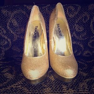 Gold sparkly high heels