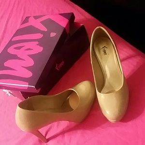 Nude closed toe heels