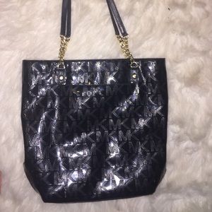 Shiny black with gold chain strap Michael Kors bag