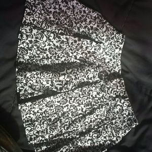 Black and white floral pleated skirt