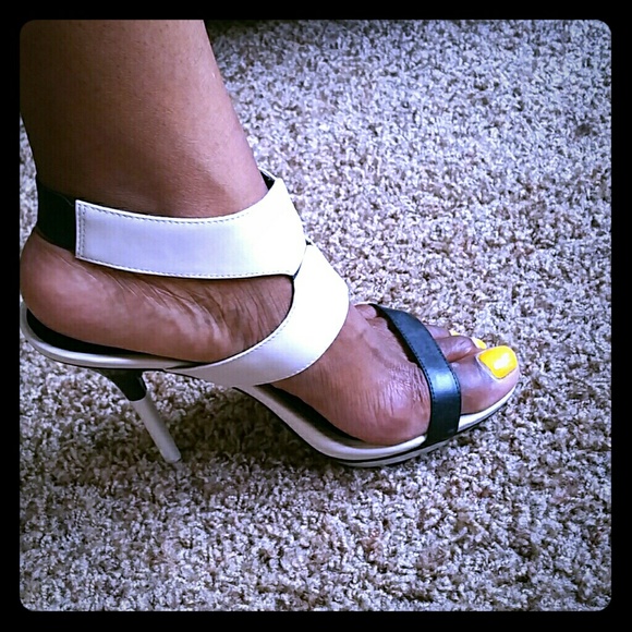 Cream and black platform heels