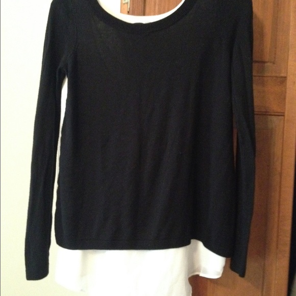 Express Sweaters - Express sweater with split back.