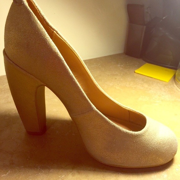 Gorgeous matte gold heels. Only used once.