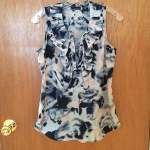 Ruffled sleeveless blouse