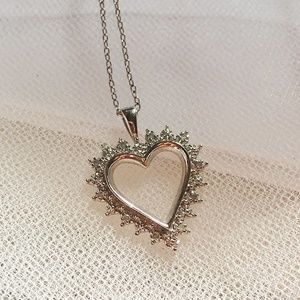 Gorgeous diamond accented silver heart necklace!