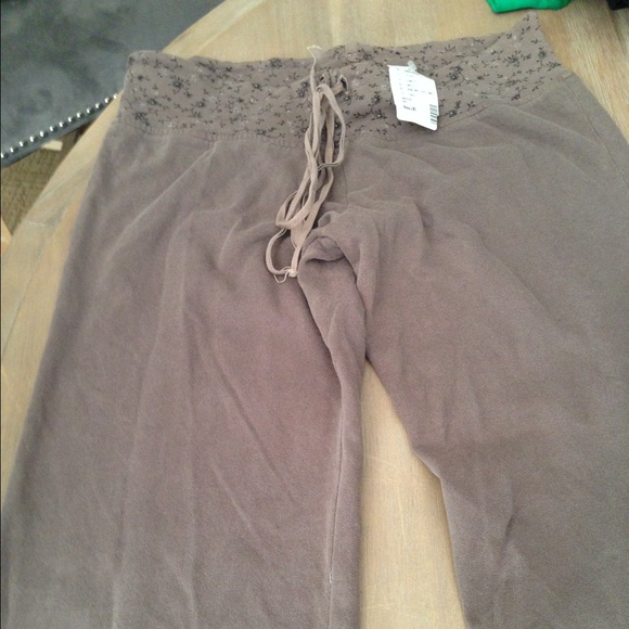 Taupe sweat pants .