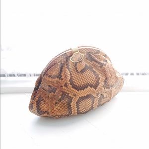 Snake skin clutch from Italy