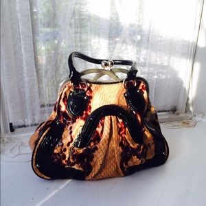Patent boutique purse