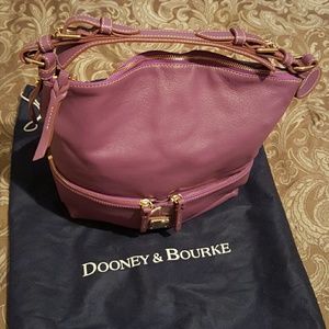 Sold locally Dooney &Bourke purple leather handbag