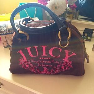 Slightly used small juicy couture purse.