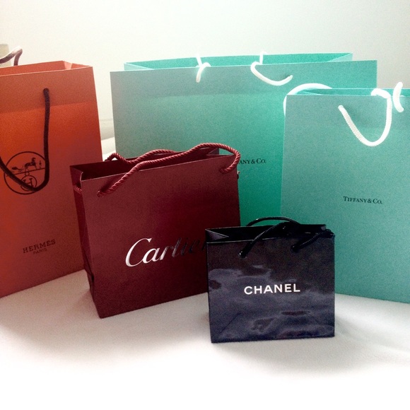Hermes, Cartier, Tiffany & Co, and Chanel bags