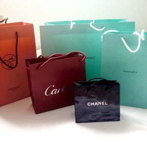 Hermes, Cartier, Tiffany & Co, and Chanel bags