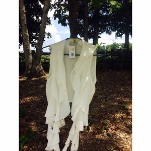 White sleeveless cardigan still w/ tags