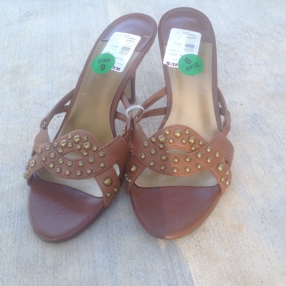 Brown Strapless Sandals with gold detail.