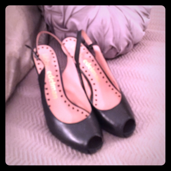 Black peep toe sling back pumps