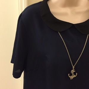 NWOT Navy blue top with black Peter Pan Collar