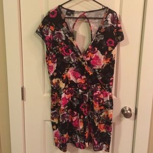 Floral romper with cutout back!