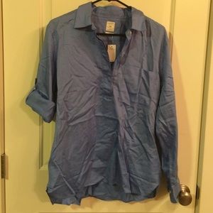 Blue satin sheen pullover with roll up sleeves