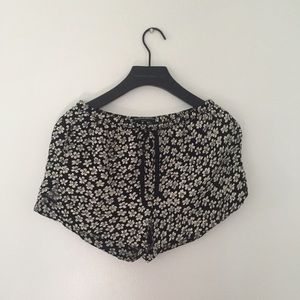 Brandy Melville • Black/White Flower Shorts