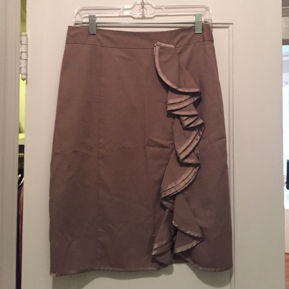 Tan skirt with gorgeous ruffle detail.