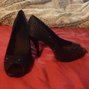 Black studded open-toe heels