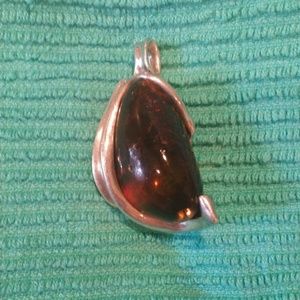 Solid amber pendant