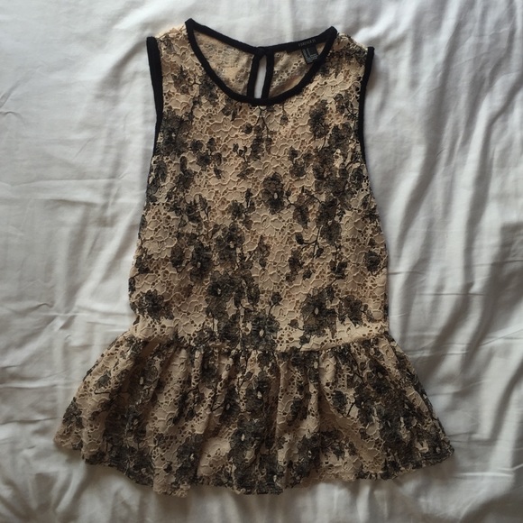 Blush and Black peplum tank.