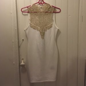 White dress with gold design