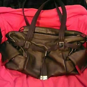 Handbag brown bronze and color slightly used