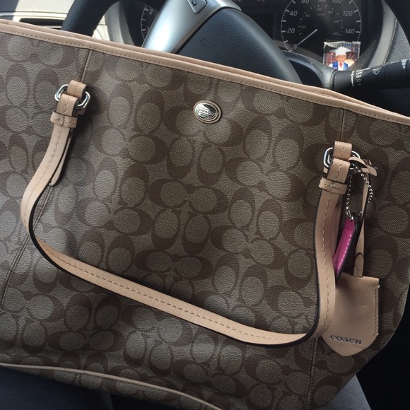 Gently used authentic coach. Pen marks inside
