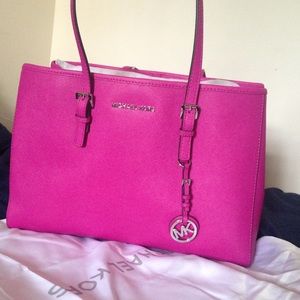 Michael Kors Jet Set Travel in Fuchsia color!